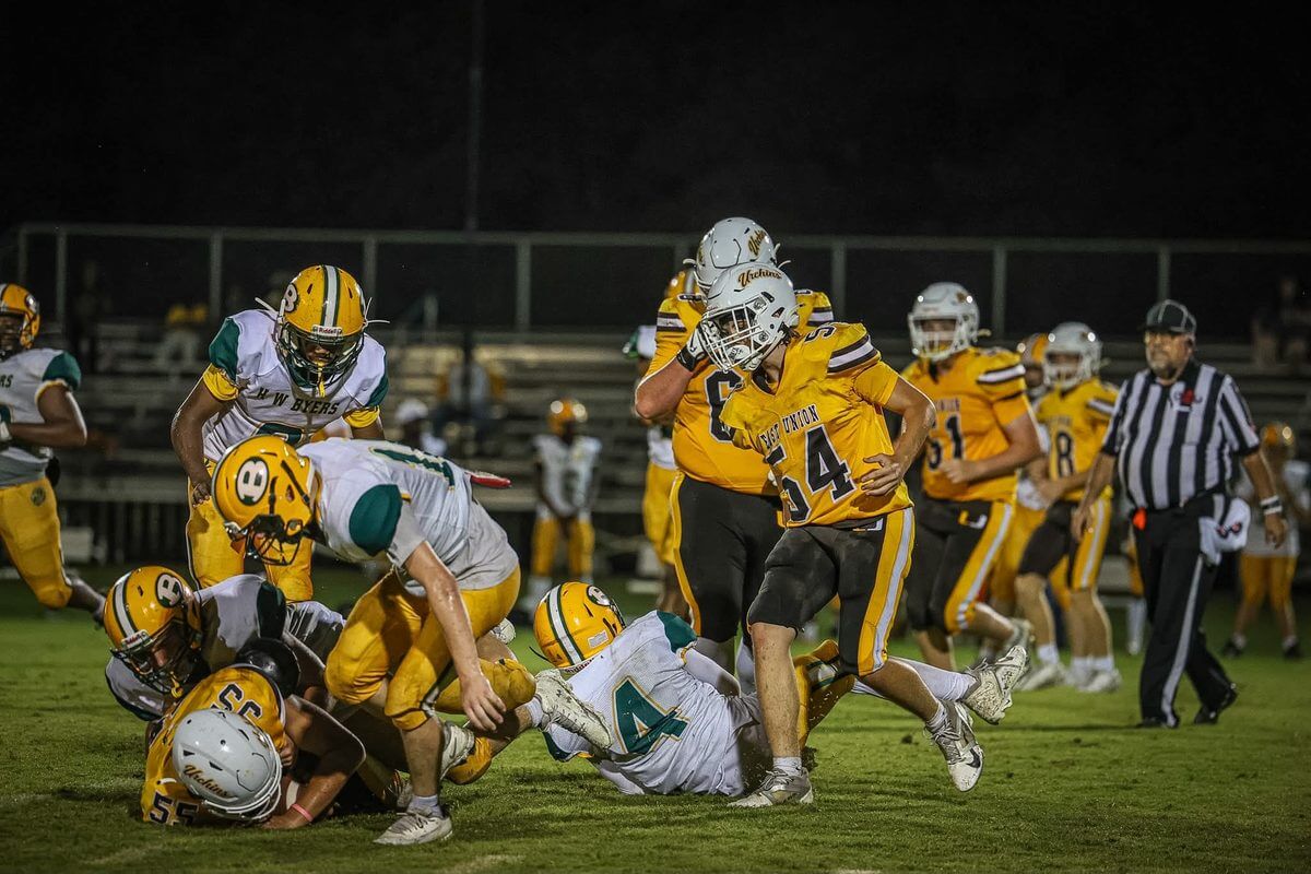 An East Union ball carrier (54) runs against H.W. Byers during the Urchins homecoming game Friday, Sept. 11, 2026.
